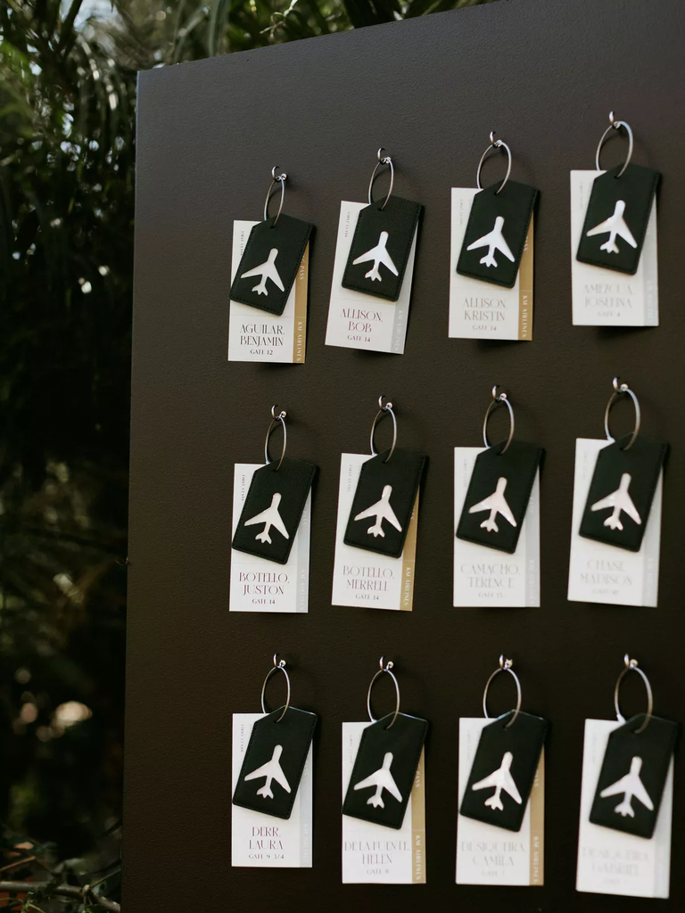 Luggage tags as chic wedding escort cards