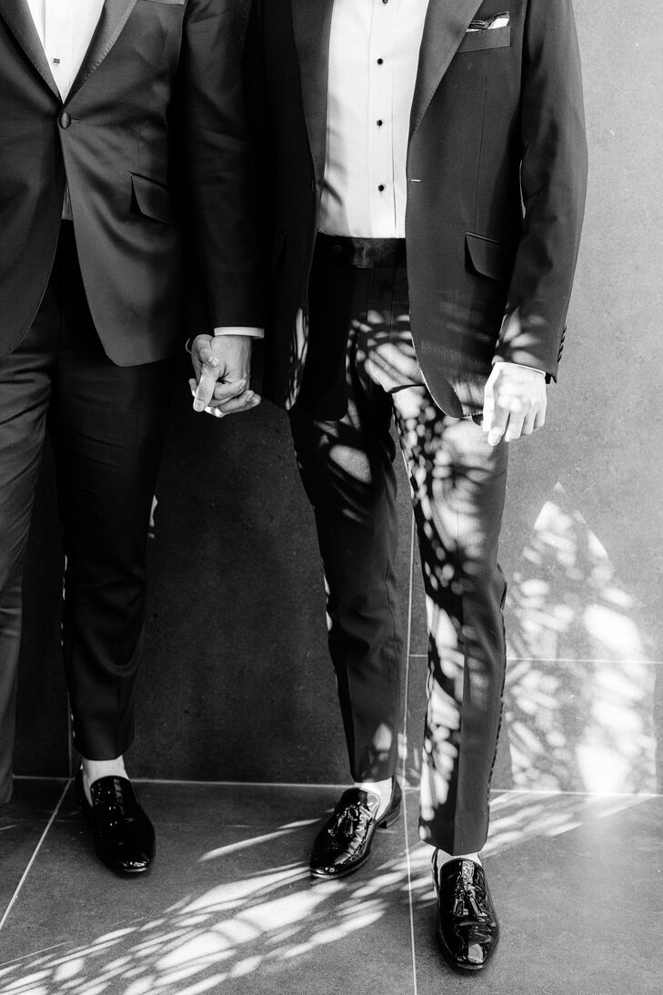 Grooms in Tuxedos Holding Hands
