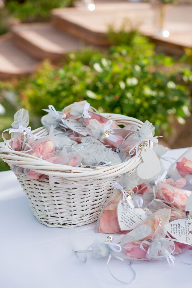Bags of rose petals were provided to shower Anna and Marc during the recessional. The newly married couple walked out to the Flaming Lips's "Do You Realize??”