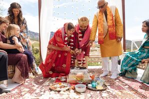 Bride in Red Lehenga and a Groom in Kurta During Indian Ceremony