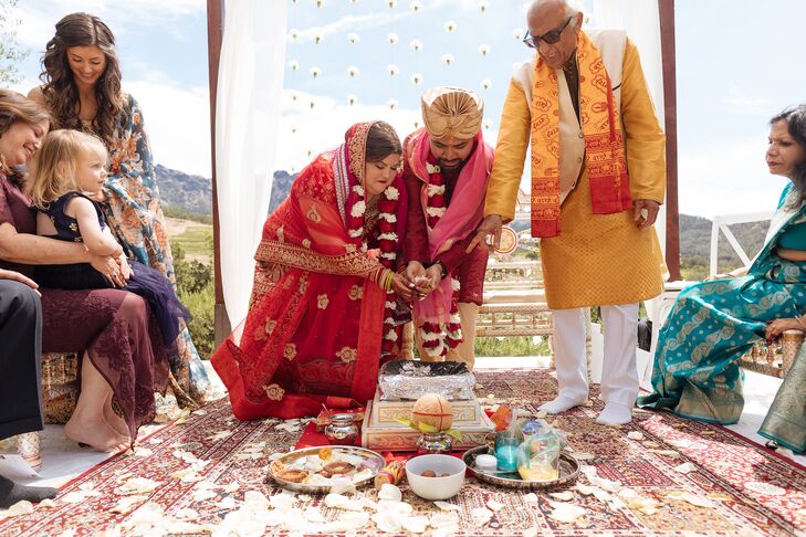 Bride in Red Lehenga and a Groom in Kurta During Indian Ceremony