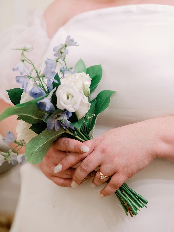 A Bride's Simple, Self-Created Bouquet With Blue-and-White Flowers