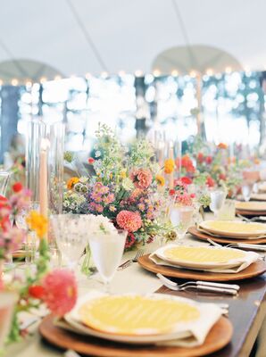 Long Dining Tables With Wildflower Centerpieces Between Candles