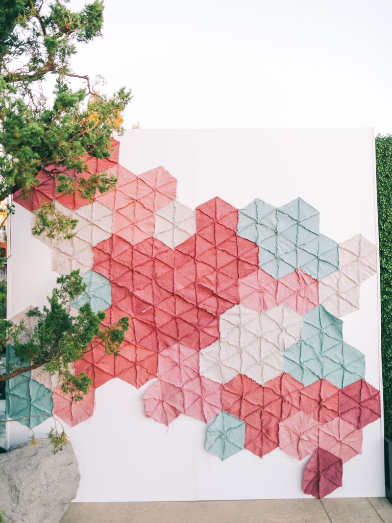 Photo booth backdrop with quilt