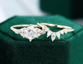 Hexagon cut moissanite diamond with diamond cluster border and marquise pear wedding ring on rose gold band