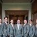 Alex wore a gray Calvin Klein suit with a solid gray tie (the groomsmen wore tan and white polka-dot ties). Melissa surprised Alex with a pocket square made with a piece of his grandfather’s blue bandana.
