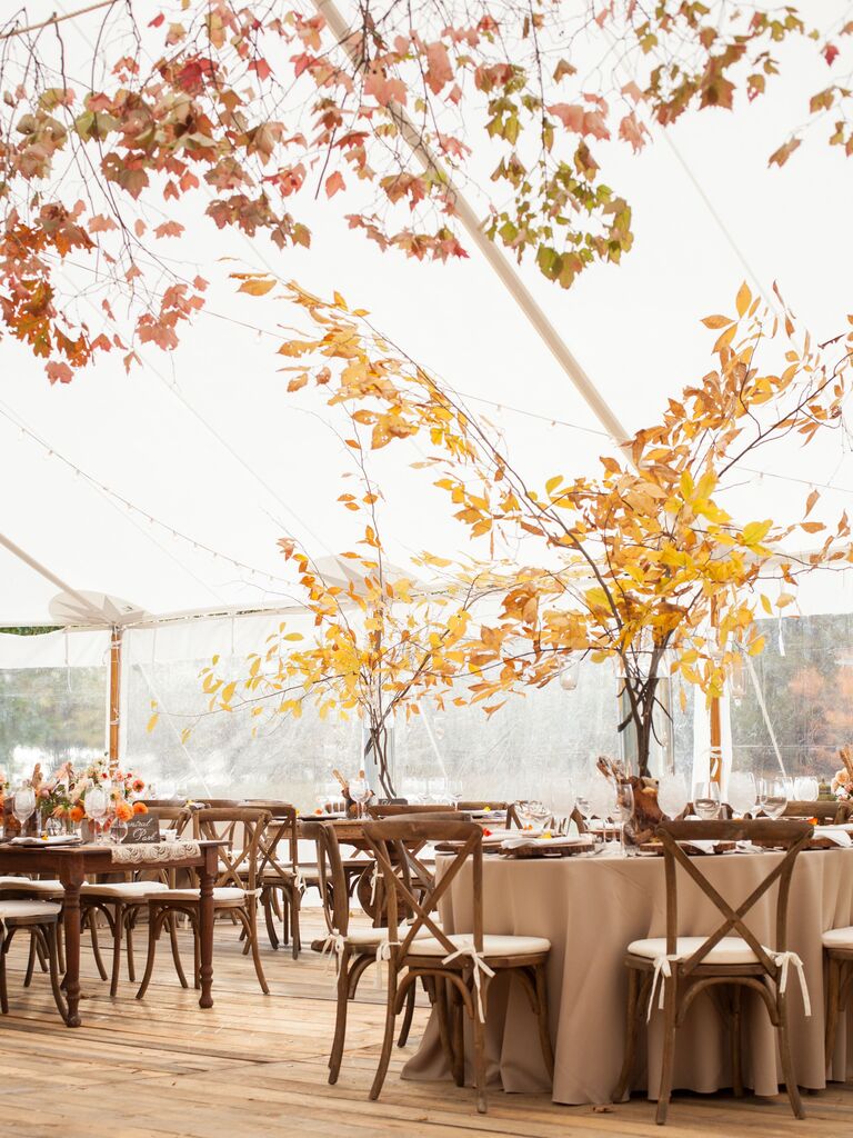 tall wedding centerpieces with colorful autumn foliage branches with red and orange leaves