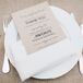 Silvia printed the thank you cards placed at each guest's seat and dipped the edges in gold paint to match the gold-rimmed china.