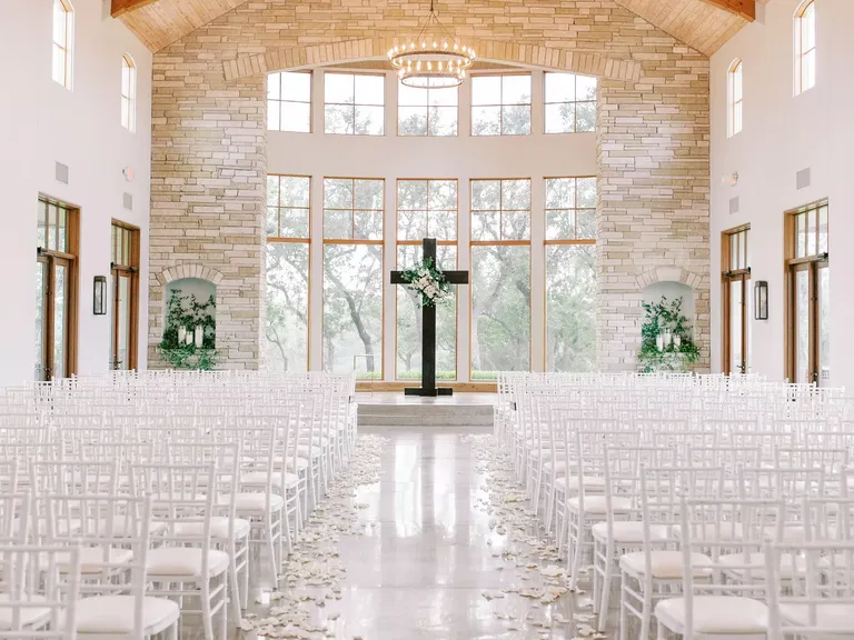 Floor to Ceiling Windows Decorate This Indoor Rustic Wedding Ceremony