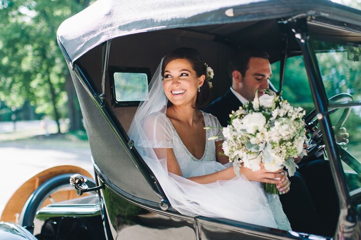 Guests cheered as the newlyweds drove off in a restored 1924 Model-T that the groom's father inherited. "After the ceremony, Matt drove us around our hometown and we shared some nice private time before the reception kicked off," Anna says.