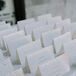 Simple White Place Cards with Gold Dot Design