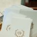 Monogrammed Gold Laurel Wreath Programs