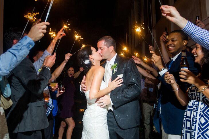 The couple left the reception surrounded by family and friends lighting sparklers in celebration.