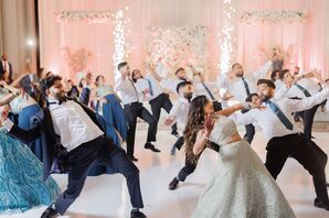 Bride in Lehenga, Groom in Tuxedo and Bridal Party Members Do Choreographed Reception Dance