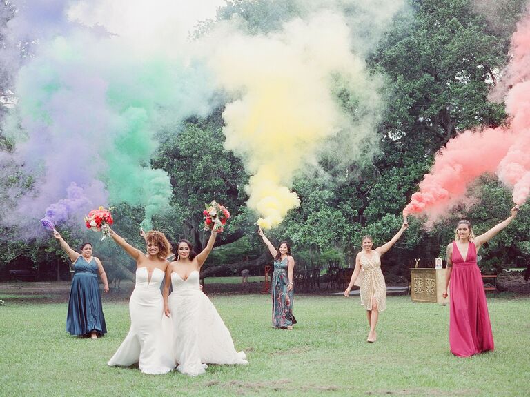 Colorful smoke bombs as a wedding send-off idea.
