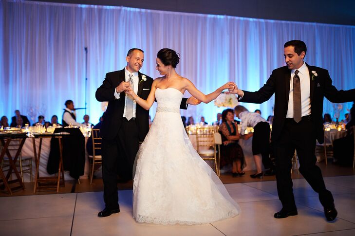 “When it came to choosing my wedding dress, I wanted something very traditional and classic that would be timeless,” Maria says. “I chose a Vera Wang dress with an illusion sweetheart and soft A-line silhouette with three layers of Chantilly lace. I added a Monique Lhuillier beaded belt covered in lace.”
