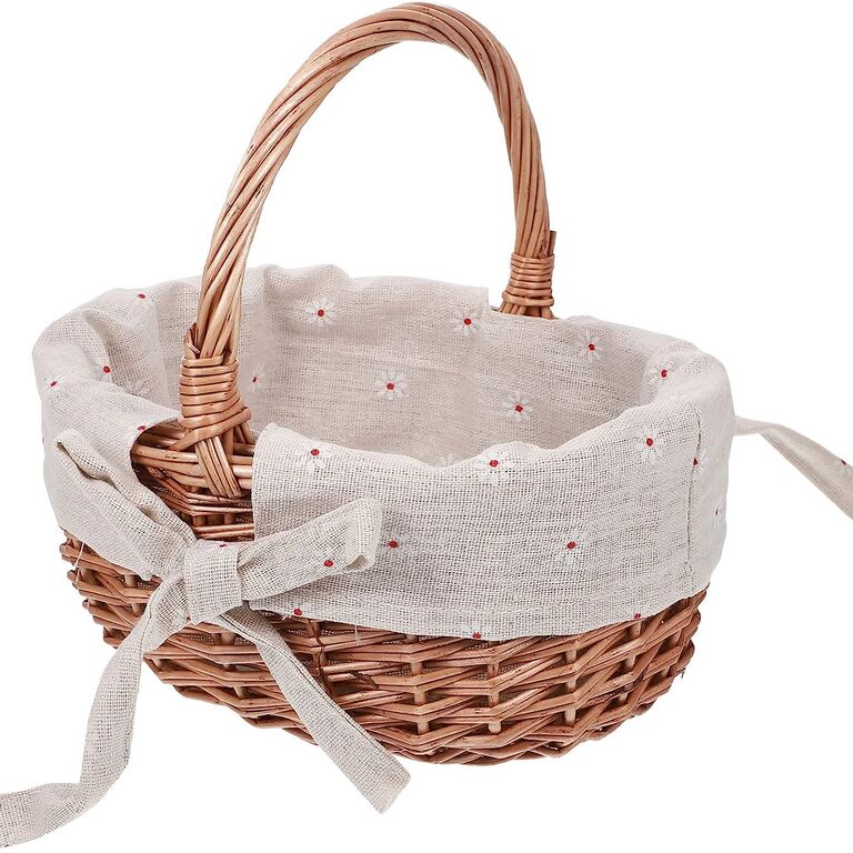 Woven basket with cloth lining for your wedding flower girl