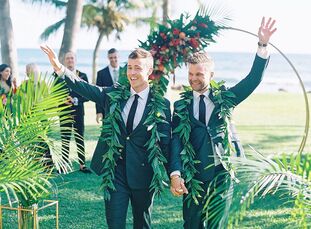 “We remember just standing there, holding hands, saying, ‘There is no way this is our wedding. This is perfect,’” newlyweds Mike Watkins and Killian S