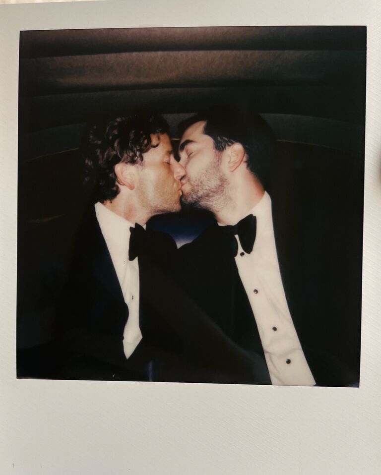 Polaroid of Michael Mendieta and Whitaker Irvin kissing on wedding day