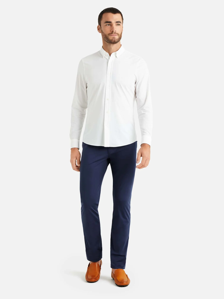 A model shows off these navy blue slacks.