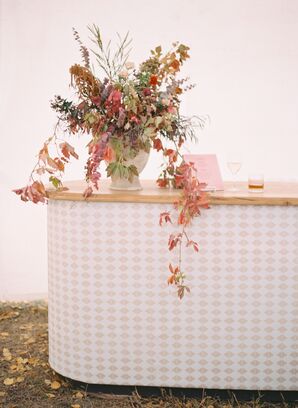 Custom Patterned Bar Front and Rustic Urn Arrangement