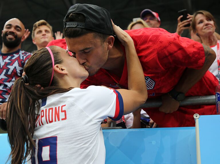Alex Morgan and Servando Carrasco kissing at the 2019 FIFA Women's World Cup Final in France 