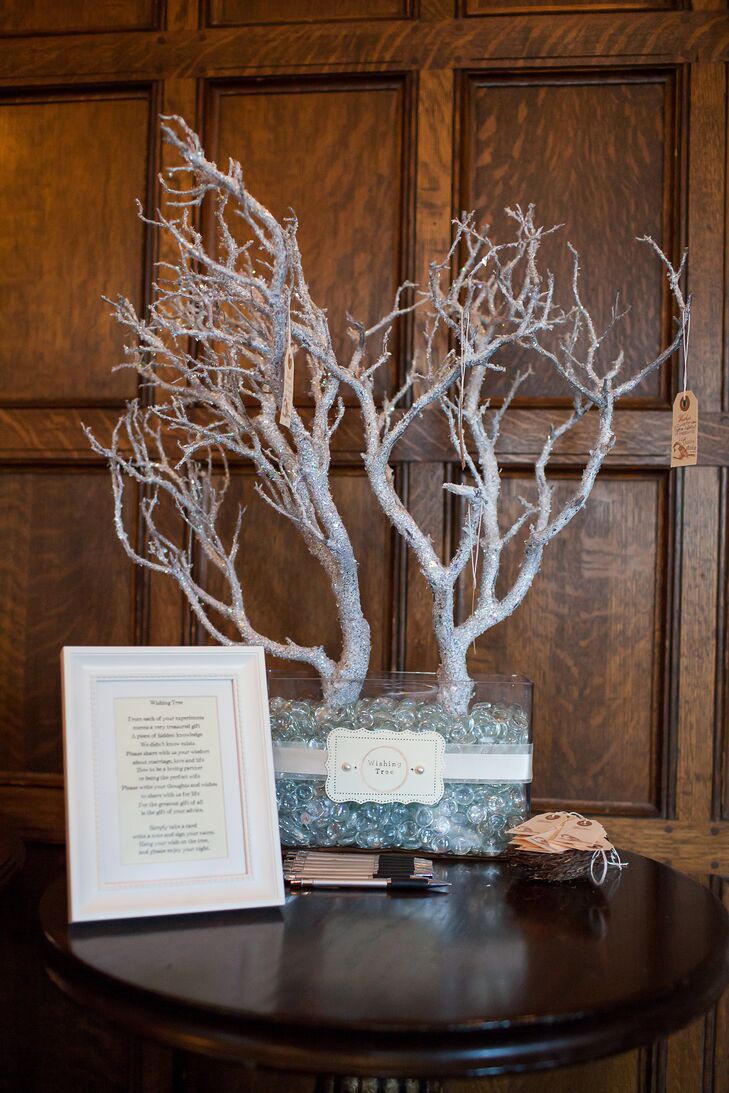 The couple made a lovely wish tree, and invited guests to write messages on the light brown gifts tags and tie them to the tree.