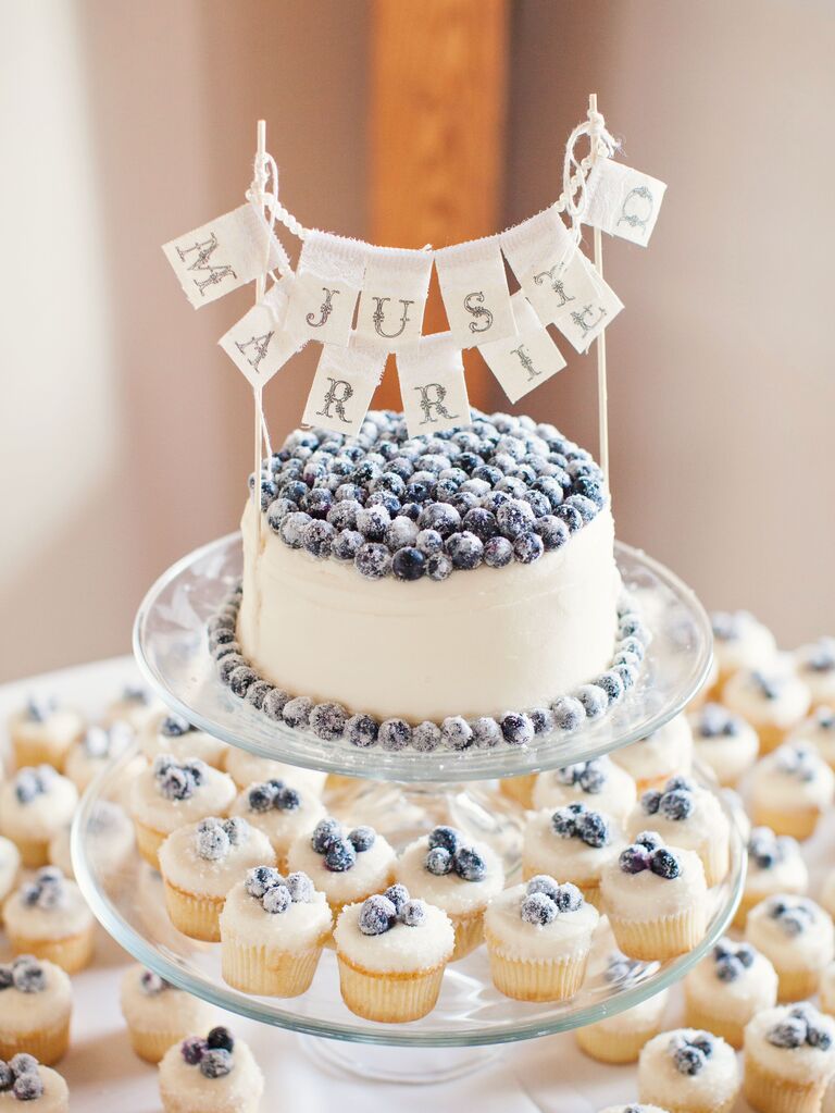 one tier buttercream wedding cake with fresh blueberries and just married cake topper 