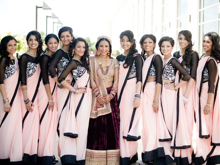 Bridesmaids in black and blush pink wedding sarees for a romantic wedding. 