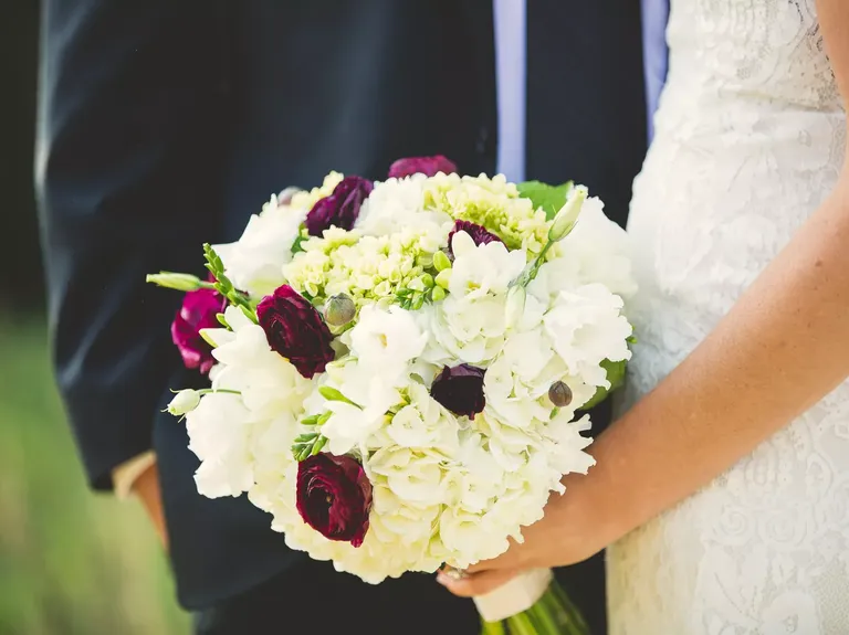 Elegant Purple Ranunculus Wedding Bouquet With White Hydrangeas
