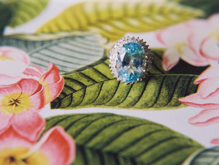 Laura wore her grandmother's aquamarine engagement ring as her "something blue" for the day.