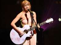 Taylor Swift performing songs from Lover
