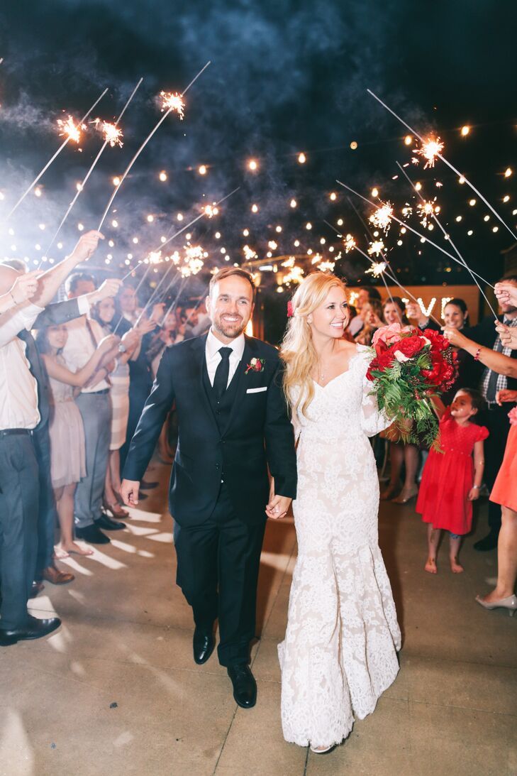 "We felt on top of the world as we walked under that sparkling canopy, seeing all the lit-up faces of the people we love," Carlie says of her and Nate's grand exit.
