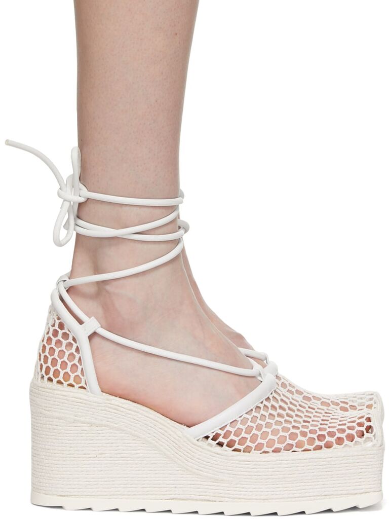 Platform heels with mesh detailing. 