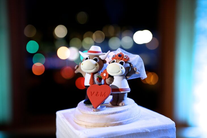 Vivian says "the number one element that reflected Mike and me as a couple and tied our wedding color together was our cake topper: two handmade, adorable UT longhorns." The couple met at the University of Texas and were wed in Dallas, Texas; the cake topper was a sweet opportunity to show off their Texas pride.
