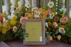 Vibrant Neon Yellow Donut Dessert Menu Amongst Colorful Wildflower Arrangement