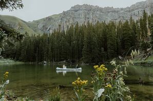 A Canoe on a Lake in Telluride, Colorado, With the Bride and Groom Boating