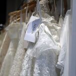 davids bridal gowns on a rack 
