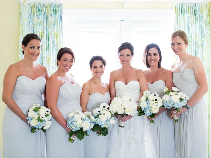 The five bridesmaids wore oyster-colored Dessy dresses with a sweetheart neckline. Margot bought each bridesmaid Julie Vos earrings as a gift to wear.
