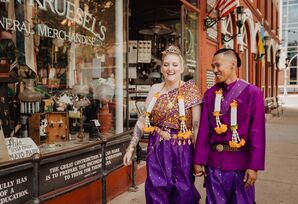 Bride and Groom Walk in Traditional Khmer Clothing At Cambodian Wedding