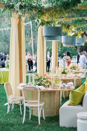 Blue Chandeliers and Wicker Chairs at Boho Reception
