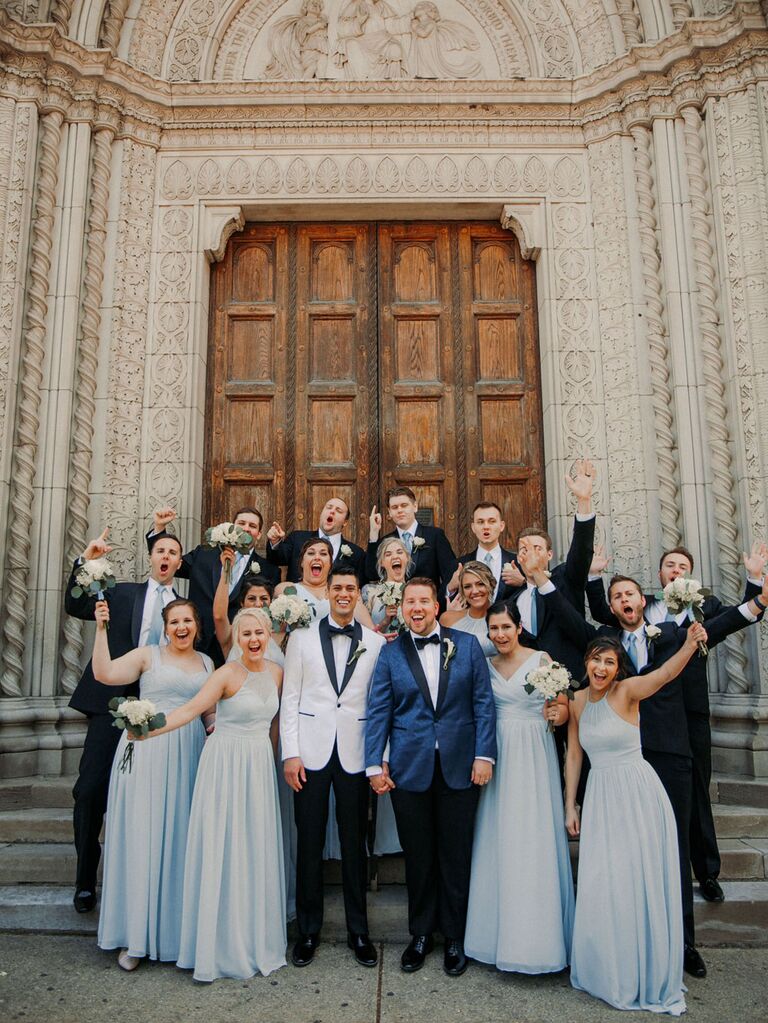Grooms with wedding party outside ceremony site