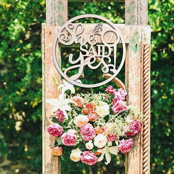 Wooden sign for a bachelorette that reads "She said yes!"