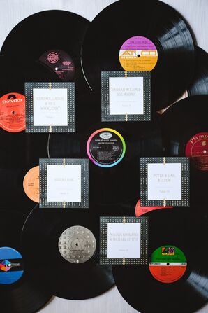 Personalized Vinyl Records As Escort Cards for Guests at Detroit, Motown-Themed Wedding Reception