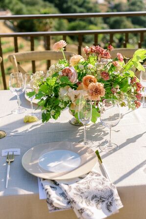 Centerpiece With Carnations and Ranunculus