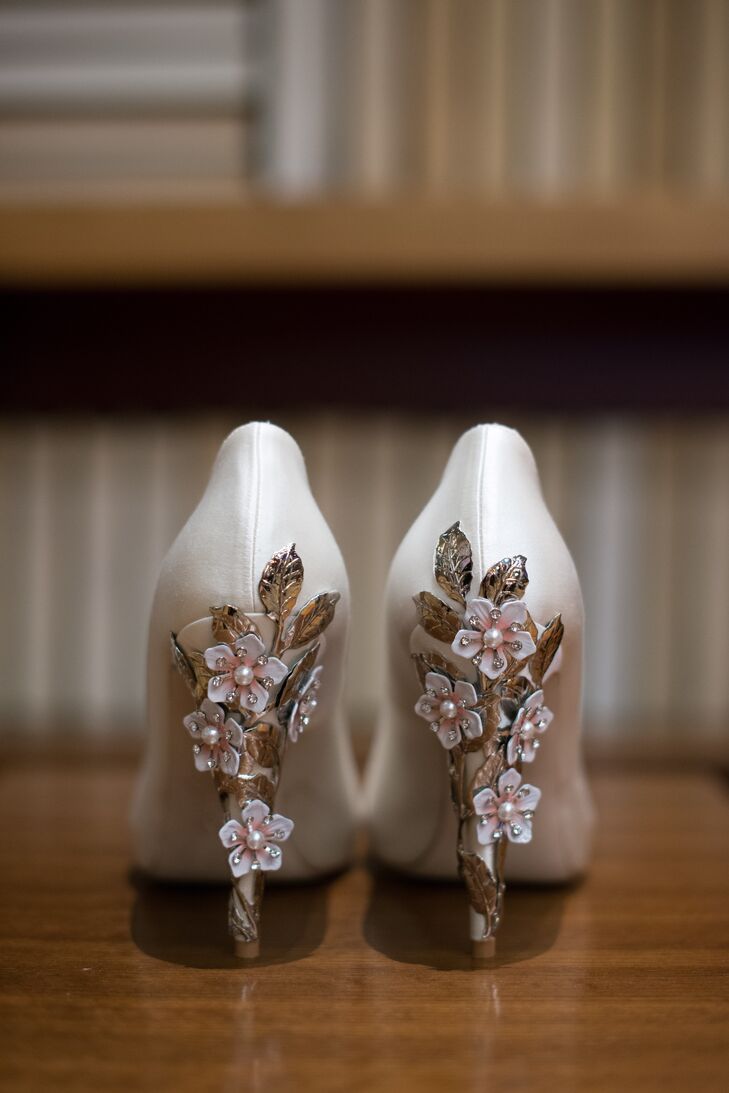 "My shoes were some of the most beautiful ones I've ever owned," Marisa says. "They had metallic cherry blossoms going down the heels that covered the cream silk of the rest of the shoe." She also brought a pair of sneakers, which were a must-have for the reception.
