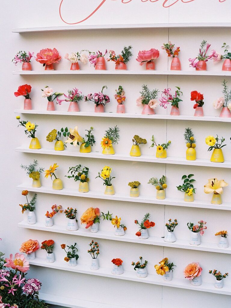 Colorful escort card wall for your maximalist wedding
