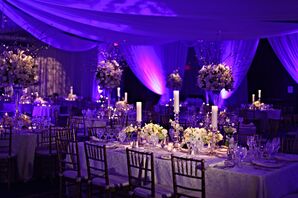 White Candles and Lush Flower Arrangements