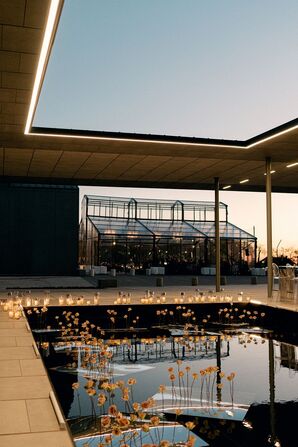 Candles Beside Reflecting Pool at Sunset at Hall of Lights in Carrollton, Texas