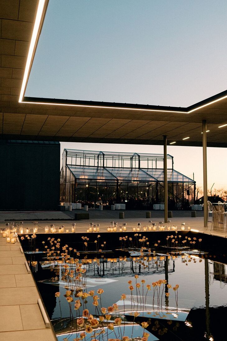 Candles Beside Reflecting Pool at Sunset at Hall of Lights in Carrollton, Texas